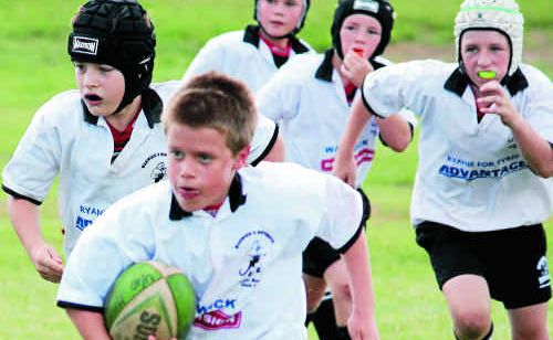 Ryan Balint heads to the try line for Warwick in junior rugby. Tom Staunton, Mitchell Bourke, William Ole and Toby Gilmore are in support. Ryan Balint heads to the try line for Warwick in junior rugby. Tom Staunton, Mitchell Bourke, William Ole and Toby Gilmore are in support.